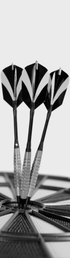 MBMs Target - Three darts in the center of a dartboard, Close-up